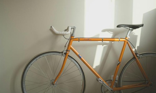 a bicycle parked in a room