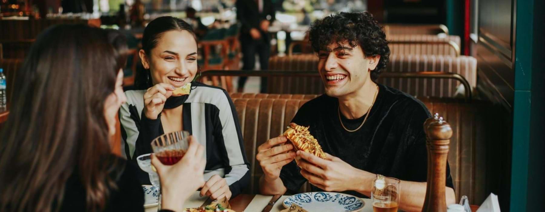 a group of people eating food