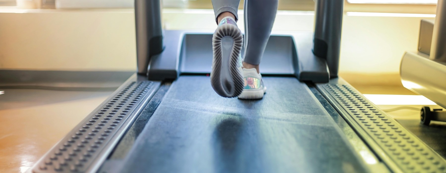 a person's legs on a treadmill